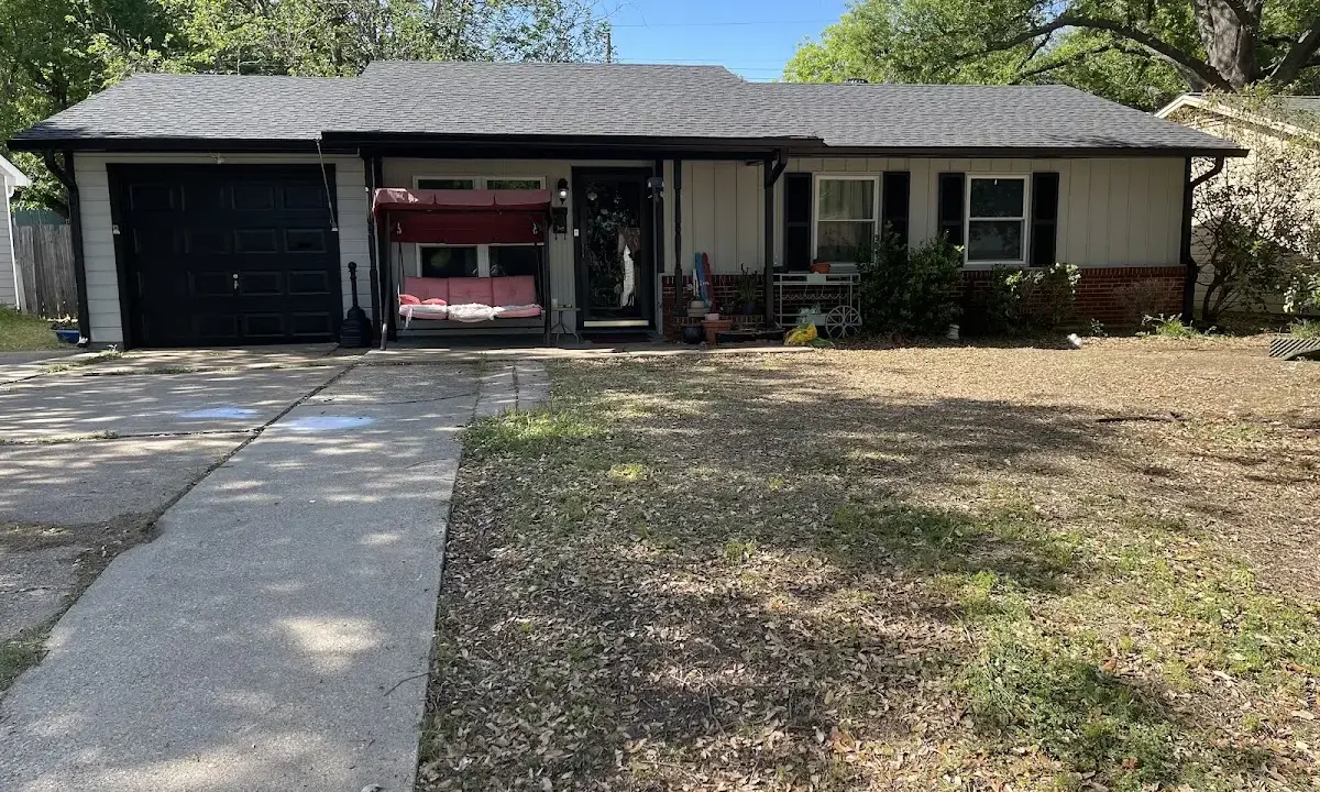 Asphalt Shingle Roof Repair crew at work on a residential roof in Bessemer City
